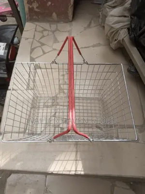 Hand Holding Grocery Basket