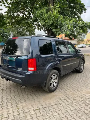 Honda Pilot Touring w/RES/Navi 4WD (3.5L 6cyl 5A) 2010 Blue