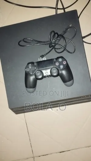 Playstation 4 Pro 1tb With FC 27 and Over 16 Games