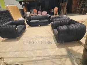 Black 7 Seaters Padded Sofa Chairs.