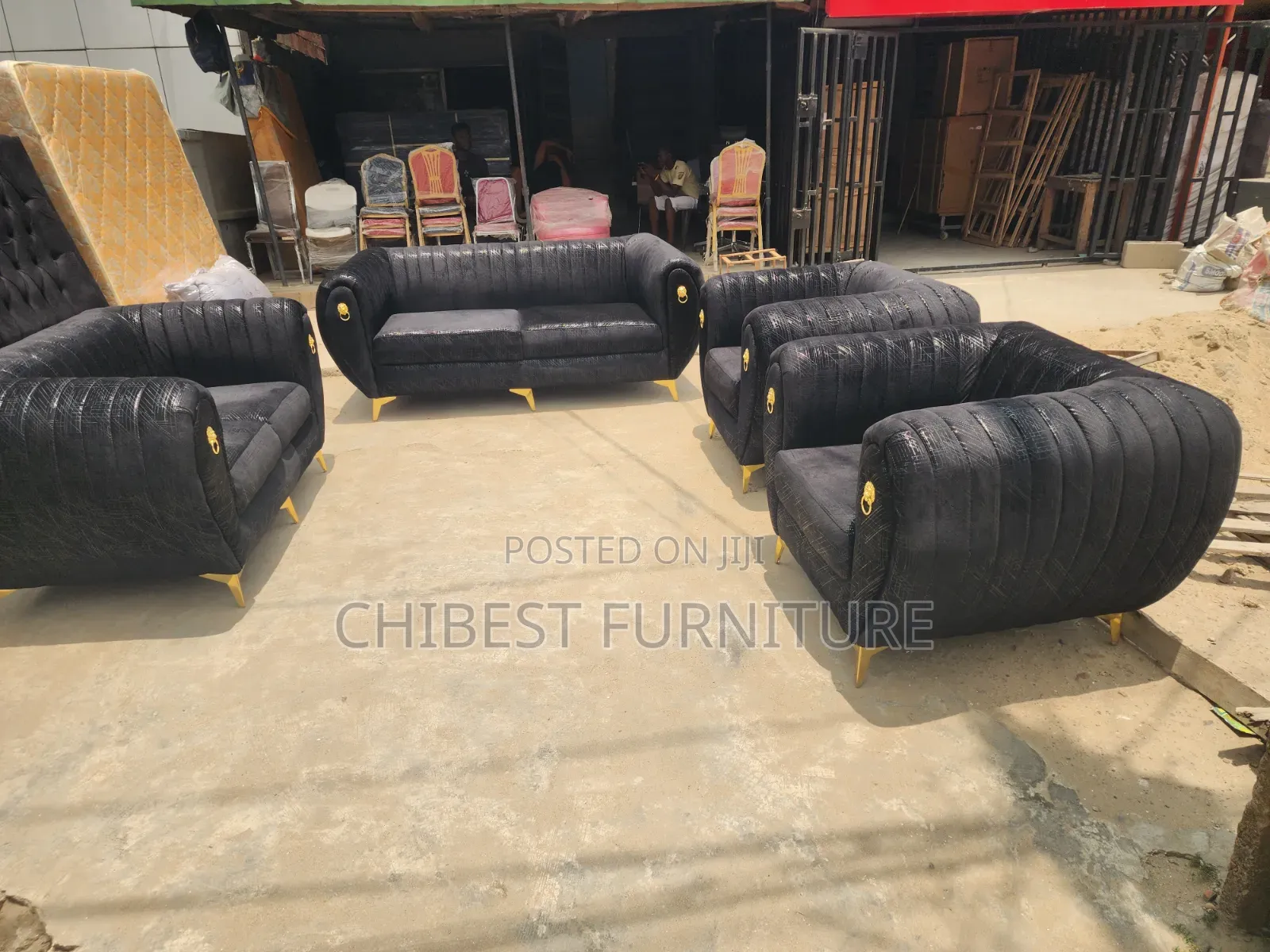 Black 7 Seaters Padded Sofa Chairs.