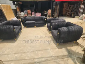 Black 7 Seaters Padded Sofa Chairs.