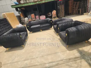 Black 7 Seaters Padded Sofa Chairs.