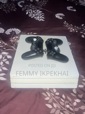 PS4 ProFor Sale With 2 Functioning Controllers