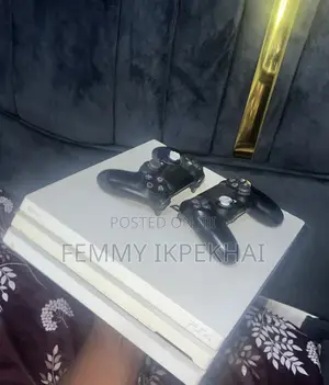 PS4 ProFor Sale With 2 Functioning Controllers