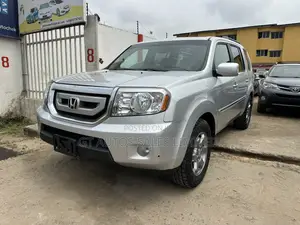 Honda Pilot Touring w/RES/Navi 4WD (3.5L 6cyl 5A) 2011 Silver
