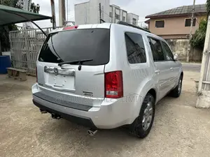 Honda Pilot Touring w/RES/Navi 4WD (3.5L 6cyl 5A) 2011 Silver
