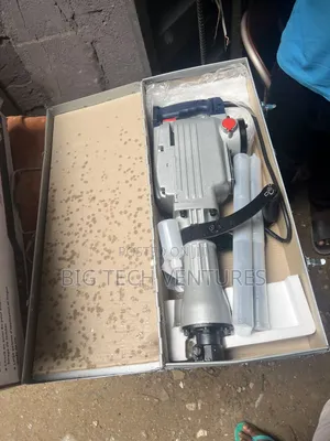 Shows a Heavy-Duty Electric Demolition Breaker (Jackhammer),