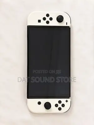 Nintendo Switch OLED – White Joy-Con | Very Clean & Working Perfectly