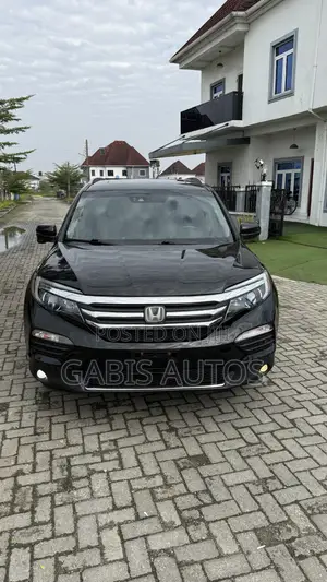 Honda Pilot Touring 4dr SUV 4WD (3.5L 6cyl 9A) 2017 Black