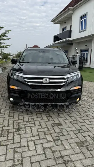 Honda Pilot Touring 4dr SUV 4WD (3.5L 6cyl 9A) 2017 Black
