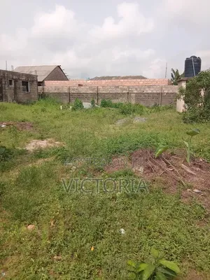 1 Plot of Land With 2 Shops, Fence, Gate Borehole for Sale in Ogijo.