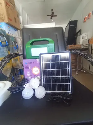 Portable Solar Powered Charging and Lighting Lamp