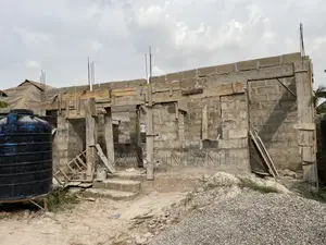 Uncompleted Building on Half Plot of Land