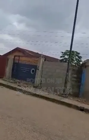 More Than Half Plot on Tarred Road Just 3 Houses to Isheri Idimu Road