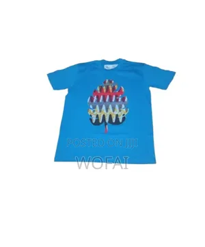 A Stylish Light Blue Polo With Vibrant Ankara DTF Detailing
