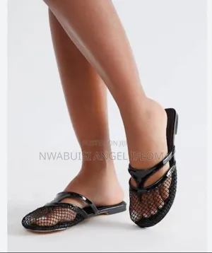 Alaia Mesh Flat Mules Sandals
