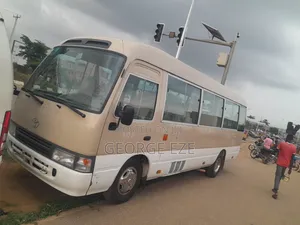 Toyota Coaster 2012 Gold