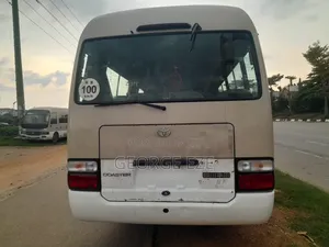 Toyota Coaster 2012 Gold