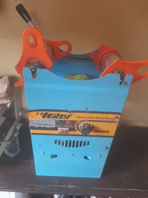 A Cup Sealing Machine.