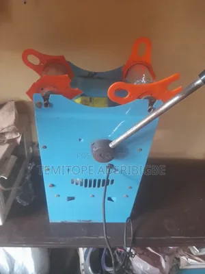 A Cup Sealing Machine.