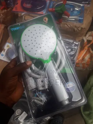 Handheld Shower Set With Hose, Holder, and Fittings.