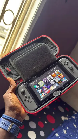 Nintendo Switch With 23games Including FC26 and a Free Pouch