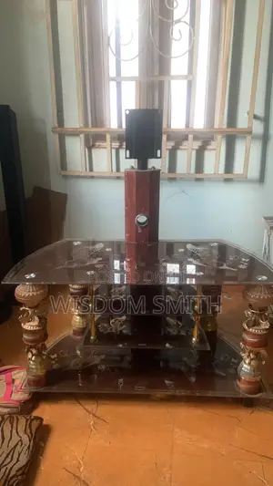 Neatly Used 3-Tier Tempered Glass TV Stand / Entertainment Console