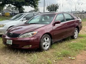 Toyota Camry LE 4dr Sedan (2.4L 4cyl 5M) 2004 Burgundy