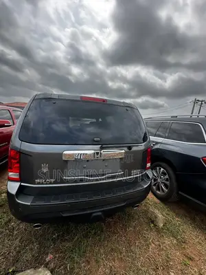 Honda Pilot Touring w/RES/Navi 4WD (3.5L 6cyl 5A) 2012 Gray