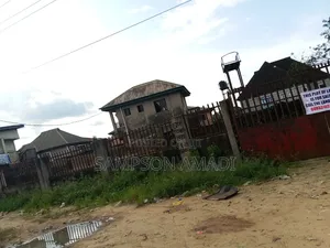 A Plot of Land for Sale Along the Road