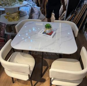 A Modern 4-Seater White Marble-Effect Square Dining Set
