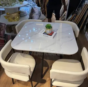 A Modern 4-Seater White Marble-Effect Square Dining Set