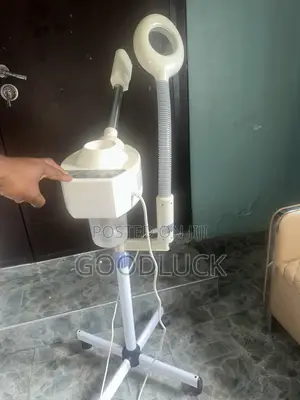 Facial Steamer Machine With a Magnifying Lamp