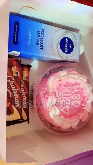 Size 4 Cake Together With Juice and Biscuits