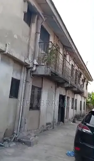 A Storey Building in a Full Plot of Land With 5 Flats Fence and Gate
