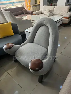 Sculptural Accent Armchair With Round Wooden Armrests