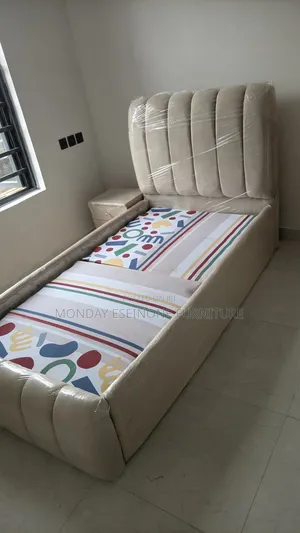 3.5 X 6 FT Cream Padded Bedframe With Side Drawer