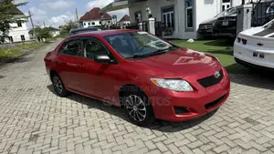 Toyota Corolla LE 4dr Sedan (1.8L 4cyl 4A) 2010 Red