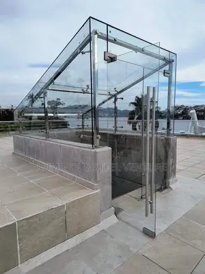 A 12mm Thick Glass for a Skylight Roof and an Elevator Uses