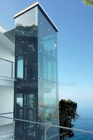 A 12mm Thick Glass for a Skylight Roof and an Elevator Uses