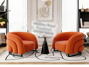 A Modern Orange Curved Accent Chair