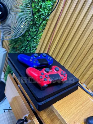 Uk Used PS4 Slim Two Pads and 8games