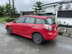 Toyota Matrix XR Hatchback AWD (1.8L 4cyl 4A) 2006 Red