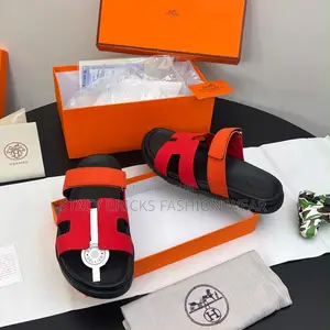 *Hermes Izmir Palm Slippers “Red Orange Suede”*