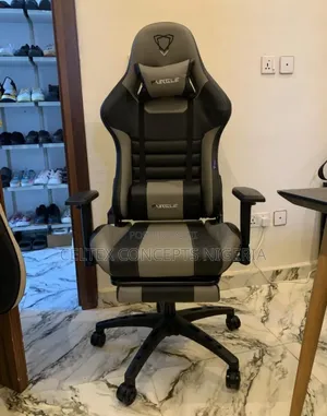 Gray and Black Gaming Chair With a  Retractable Footrest