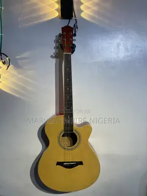 A Natural-Finish Cut-Away Acoustic Guitar With Bag