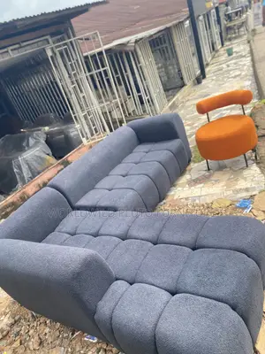 This Is a Set of L Shaped Sofas Chairs With One Single