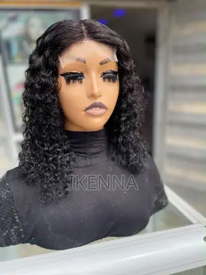 16” Jerry Curls Human Hair Wig With a Closure