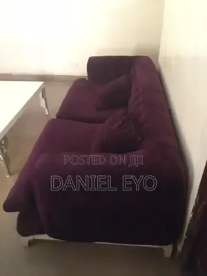 One Fairly Used Sofa Chair